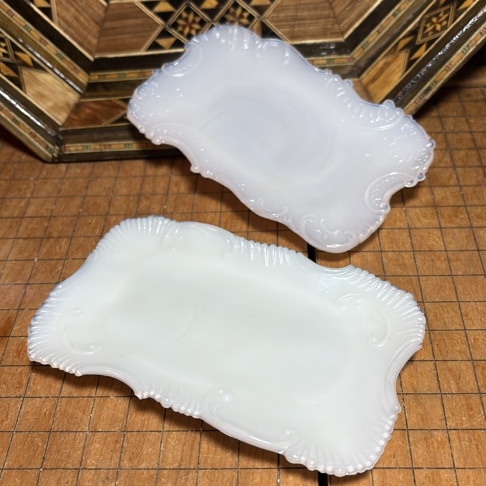 2 Milk Glass Dishes Scrolling Edge One Wirths Bros New York, One Unsigned 5”x3”